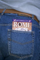 The Eternal City of Rome guide book in tourists pocket .TravelTourismHolidayVacationExploreRecreationLeisureSightseeingTouristAttractionTourDestinationEternalOfRomeRomaRomanItalyIta...