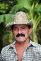 Farmer near Guardalavaca.Caribbean Cuban TravelTourismHolidayVacationExploreRecreationLeisureSightseeingTouristAttractionTourDestinationTripJourneyDaytripGuardalavacaHolguinProvince...