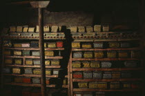 Ancient sacred texts stored in library of old palace of Tsarang  their volumes kept between intricately carved covers.Asia Asian Nepalese Religion Religious History