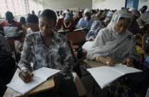 Students writing at desks in law school.African Learning Lessons Nigerian Teaching Western Africa