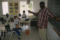Teacher and pupils in classroom of private school.African Kids Learning Lessons Nigerian Teaching Western Africa