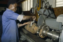 Male worker in generator factory.African Nigerian Western Africa