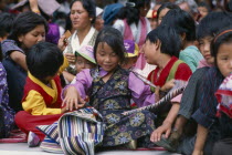 Tibetan children celebrating the birthday of the Dalai Lama.Asia Asian Bharat Inde Indian Intiya Kids