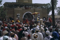 Salah Day marking the end of Ramadan.  Crowds surrounding the Emir and his retinue as he returns to his palace. African Nigerian Religion Western Africa Religious
