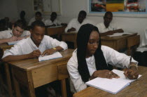 Students sitting at desks in a Primary schoolAfrican Kids Learning Lessons Nigerian Teaching Western Africa