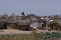 Circular thatched mud huts in the village between Abuja and KeffiAfrican Nigerian Western Africa