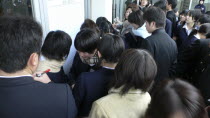 Chiba  Sosa - Yokaichiba Kei Ai High School  14 and 15 year old third year junior high school students check to see if their number is posted meaning they passed trhe high school entrance examAsia As...