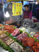 Namdaemun - Namdaemun Market  December evening  food stall with chicken  meat  and fish waiting to be cookedAsia Asian Japanese Nihon Nippon Classic Classical Daehanminguk Hanguk Historical Korean Ol...