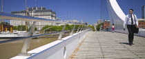 Footbridge in Puerto Madero.South AmericaBuenos AiresTravelTourismHolidaysPuerto MaderoPuente de la MujerPanoramaBridgePedestrianSpanAmerican Hispanic Latin America Latino One individual S...