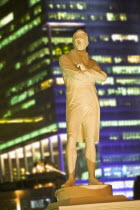 Statue of Sir Stamford Raffles illuminated at night.NightTourismHolidaysTravelSingaporeAsiaFar EastRafflesStatuePoseAsian Nite Singaporean Singapura Southeast Asia Xinjiapo