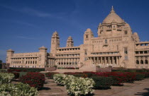 Umaid Bhawan Palace exterior seen from across gardensAsia Asian Nepalese Bharat Inde Indian Intiya Male Men Guy Male Man Guy Religion Religious Kids Learning Lessons Teaching History Performance Clas...