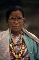 Circuit Trek. Portrait of Thakali woman wearing traditional dress and jewellery with a Bindi red spot decoration on forehead during the Lha Phewa festivalAsia Asian Nepalese Classic Classical Female...