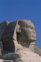 Side profile of Sphinx with the pyramid of Kharfe of Khephren behindAfrican Middle East North Africa History