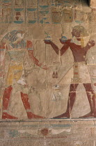 Deir-el-Bahri. Hatshepsut Mortuary Temple. Chapel of Anubis. Relief of Tuthmosis III making offerings to the sun god Ra- Harakhty.African Middle East North Africa History