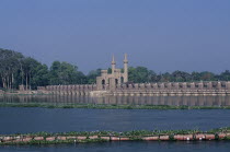 River Nile Barrage with Water Hyacinth growing across the waterAfrican Middle East North Africa Qanatir Qanater