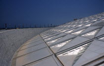 Bibliotheca Alexandrina modern library with detail of  interlocking panelled roof and walls made of grey Aswan granite carved with letters  characters and symbols from every known alphabet in the worl...