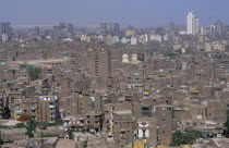 Elevated view over city rooftops with tall buildings on the skylineAfrican Middle East North Africa