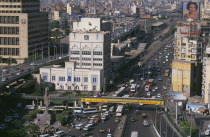 Elevated view over city buildings and busy roads with trafficAfrican Middle East North Africa