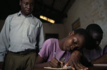 Teacher and pupils in intergrated education project for the visually impaired.African Eastern Africa Kids Learning Lessons Teaching Ugandan