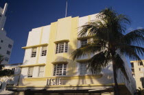 South Beach. Ocean Drive. The Leslie Hotel seen in early morning light with a palm tree casting a shadow on the exterior American North America United States of America Beaches Resort Sand Sandy Seas...