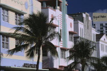 South Beach. Ocean Drive. Art Deco hotel facades and palm trees seen in early morning lightAmerican North America United States of America Beaches Resort Sand Sandy Seaside Shore Tourism