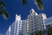 South Beach. Collins Avenue. The Delano  The National and The Sagamore Hotel facades framed by palm tree branchesAmerican North America United States of America Beaches Resort Sand Sandy Seaside Shor...