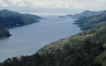 Lake and surrounding landscape of rift valley bordering the Democratic Republic of the Congo.