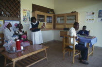 Family planning clinic  interior with visitors and staff.African Eastern Africa Kenyan Kids
