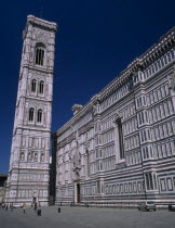 The Duomo.  Exterior wall and the Campanile  designed by Giotto in 1334 and clad in white  pink and green Tuscan marble.Firenze Italia Italian Religion Southern Europe European Religious Toscana