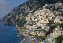 Near Positano. Elevated view towards hillside town buildings overlooking the beach and seaBeaches European Italia Italian Resort Sand Sandy Scenic Seaside Shore Southern Europe Tourism