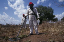 Mine Clearance Team at work in fields.