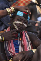 Hama Jumping of the Bulls initiation ceremony  Face painting with a mixture of clay  oils and plant pigments