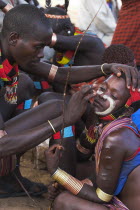 Hama Jumping of the Bulls initiation ceremony  Face painting with a mixture of clay  oils and plant pigments
