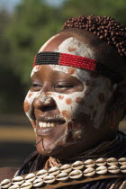 Karo woman with face painting.