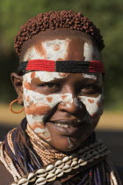 Karo woman with face painting.