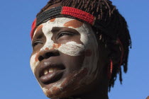 Karo woman with face painting.