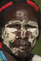 Karo man with face painting