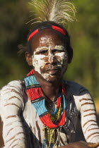 Karo man with face painting