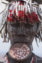 Woman with lip plate.