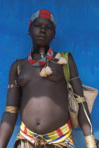 Tsemay woman traditionally dressed at weekly market