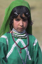 Aimaq nomad camp  Aimaq girl   The Aimaq are semi nomadic people who move out of their mud house villages after spring and live in yurts to tend their flocks before moving back to their houses in wint...