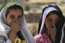 Aimaq nomad camp  Aimaq women   The Aimaq are semi nomadic people who move out of their mud house villages after spring and live in yurts to tend their flocks before moving back to their houses in win...