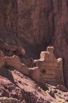 Between Kabul and Bamiyan  the southern route   Shahr-e-Zohak  Red city    Ruins archaeologists believe dates as early as the 6th Century A.D. A fortress was built atop the red cliffs to protect the e...