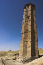 Minaret of Bahram Shah  one of two early 12th Century Minarets the other built by Sultan Masud 111  believed to have served as models for the Minaret of Jam  has square Kufic and Noshki script  Mounds...