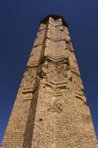 Minaret of Bahram Shah  one of two early 12th Century Minarets the other built by Sultan Masud 111  believed to have served as models for the Minaret of Jam  has square Kufic and Noshki script  Mounds...