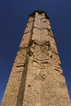 Minaret of Bahram Shah  one of two early 12th Century Minarets the other built by Sultan Masud 111  believed to have served as models for the Minaret of Jam  has square Kufic and Noshki script  Mounds...