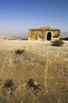 2km south of the centre of Haibak  Buddhist stupa carved out of rock known as Top-I-Rustam  Rustams throne  an early burial mound that contained relics of the Buddha  part of a stupa-monastery complex...