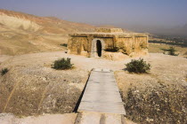 2km south of the centre of Haibak  Wooden bridge across chasm leading to Buddhist stupa carved out of rock known as Top-I-Rustam  Rustams throne  an early burial mound that contained relics of the Bud...
