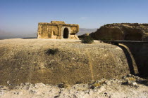 2km south of the centre of Haibak  Buddhist stupa carved out of rock known as Top-I-Rustam  Rustams throne  an early burial mound that contained relics of the Buddha  part of a stupa-monastery complex...