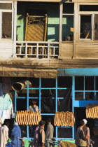 Street alongside the Kabul river  Bread shop
